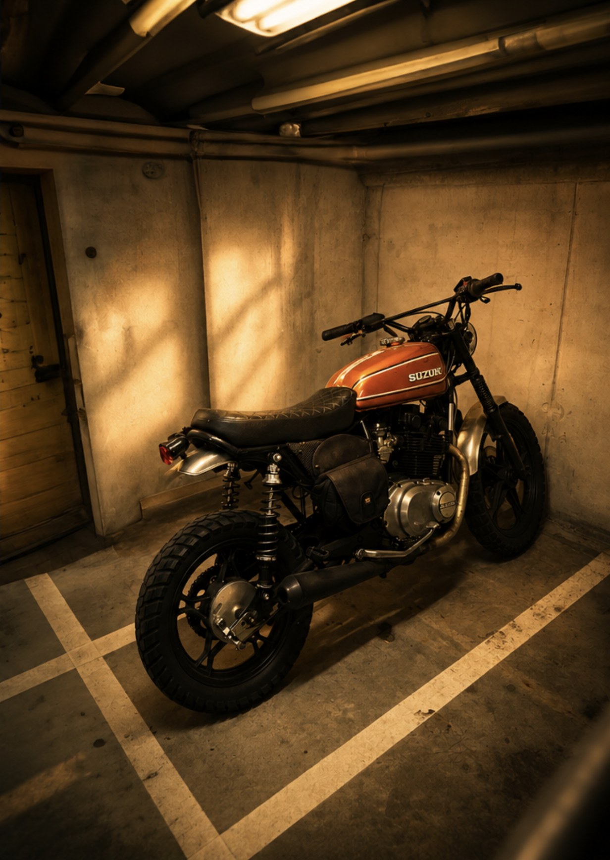Suzuki scrambler in a concrete parking garage, Amsterdam